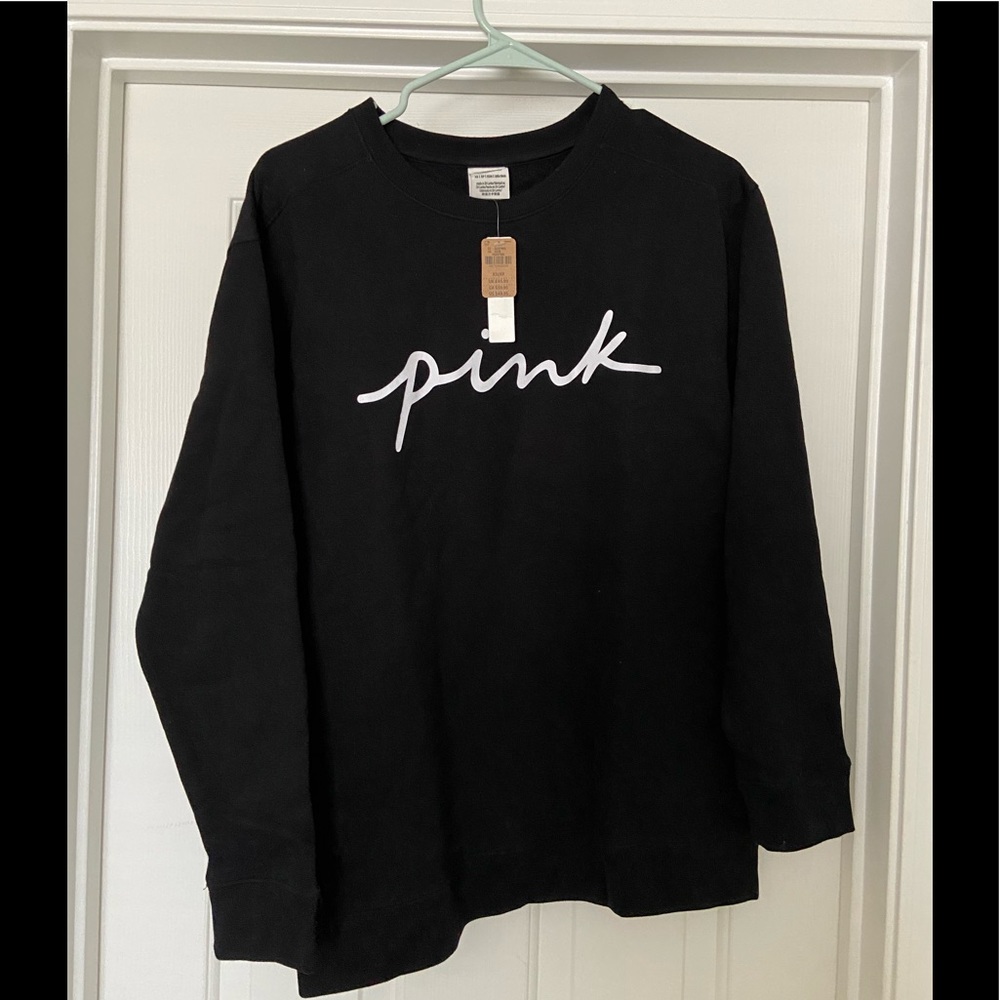 NWT Pink sweatshirt. Black. Size XS.